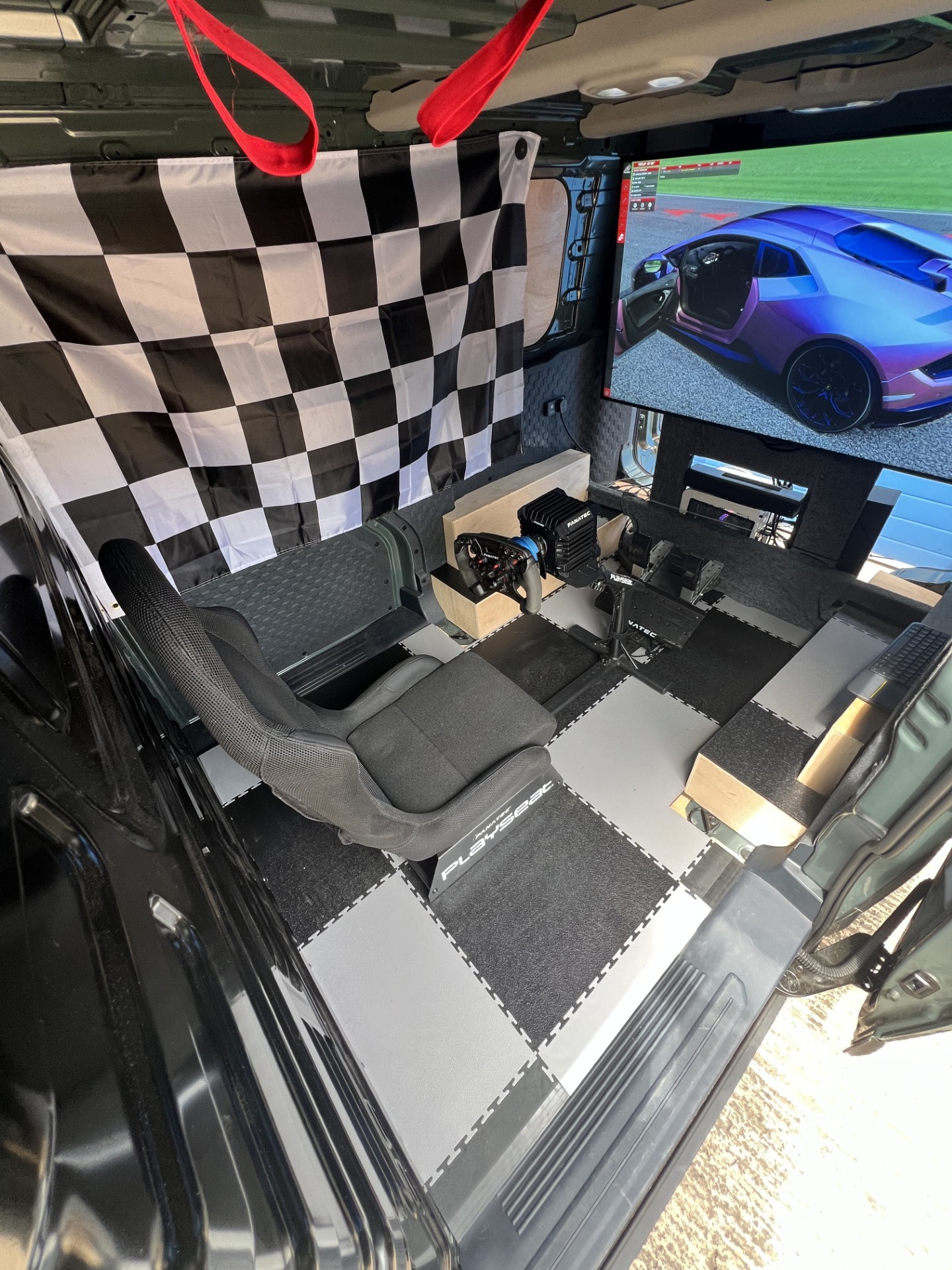 Brindley Kia helps build racing simulator powered and transported by all-electric Kia PV5 Cargo