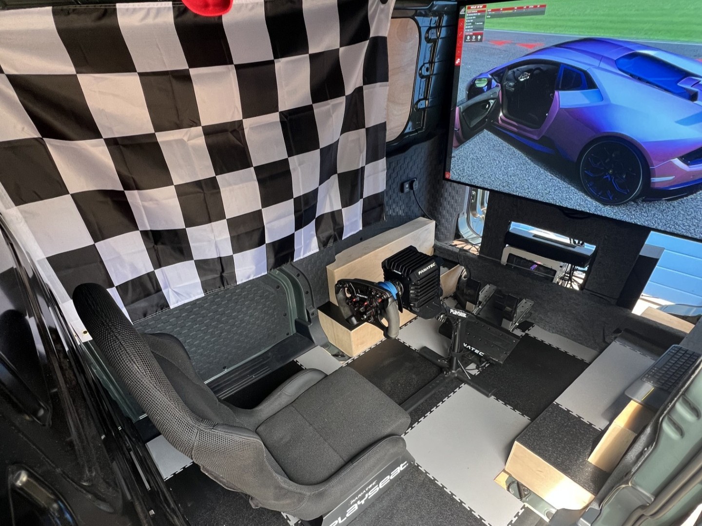 Brindley Kia helps build racing simulator powered and transported by all-electric Kia PV5 Cargo